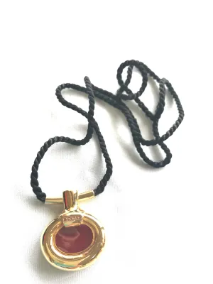 Vintage Hermes golden and red stone charm pendant top necklace with black strings. Unique jewel piece from PARFUM Collection. 060919re1